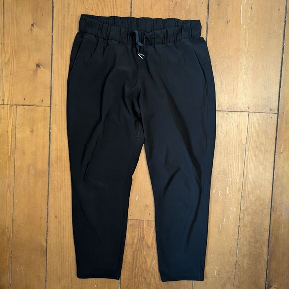 lululemon athletica Pants - Lululemon Black On the Fly Woven Drawstring Waist Pants Size 12